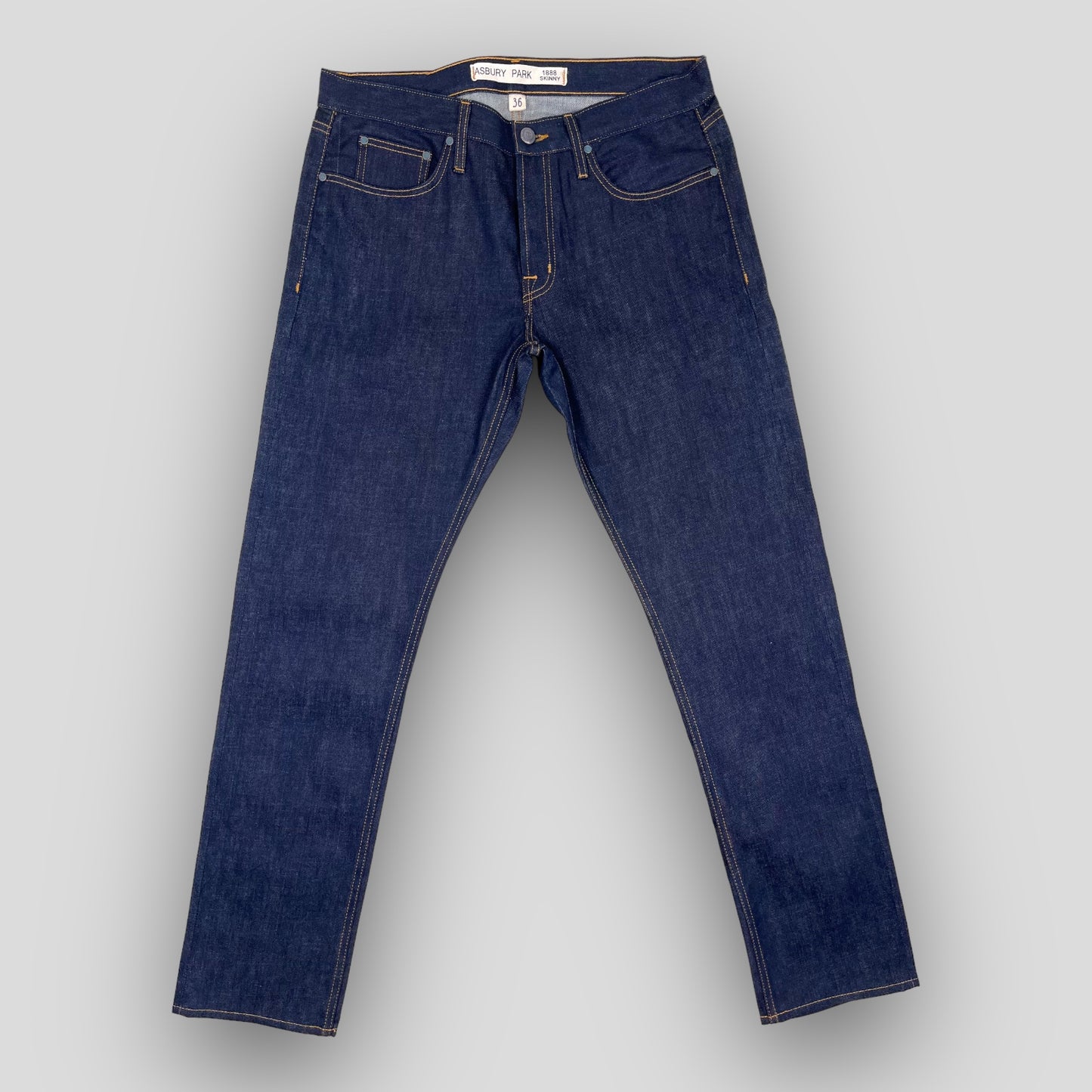 MID-RISE SKINNY FIT IN RAW SELVEDGE