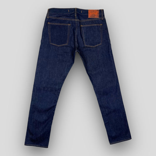 MID-RISE SKINNY FIT IN RAW SELVEDGE