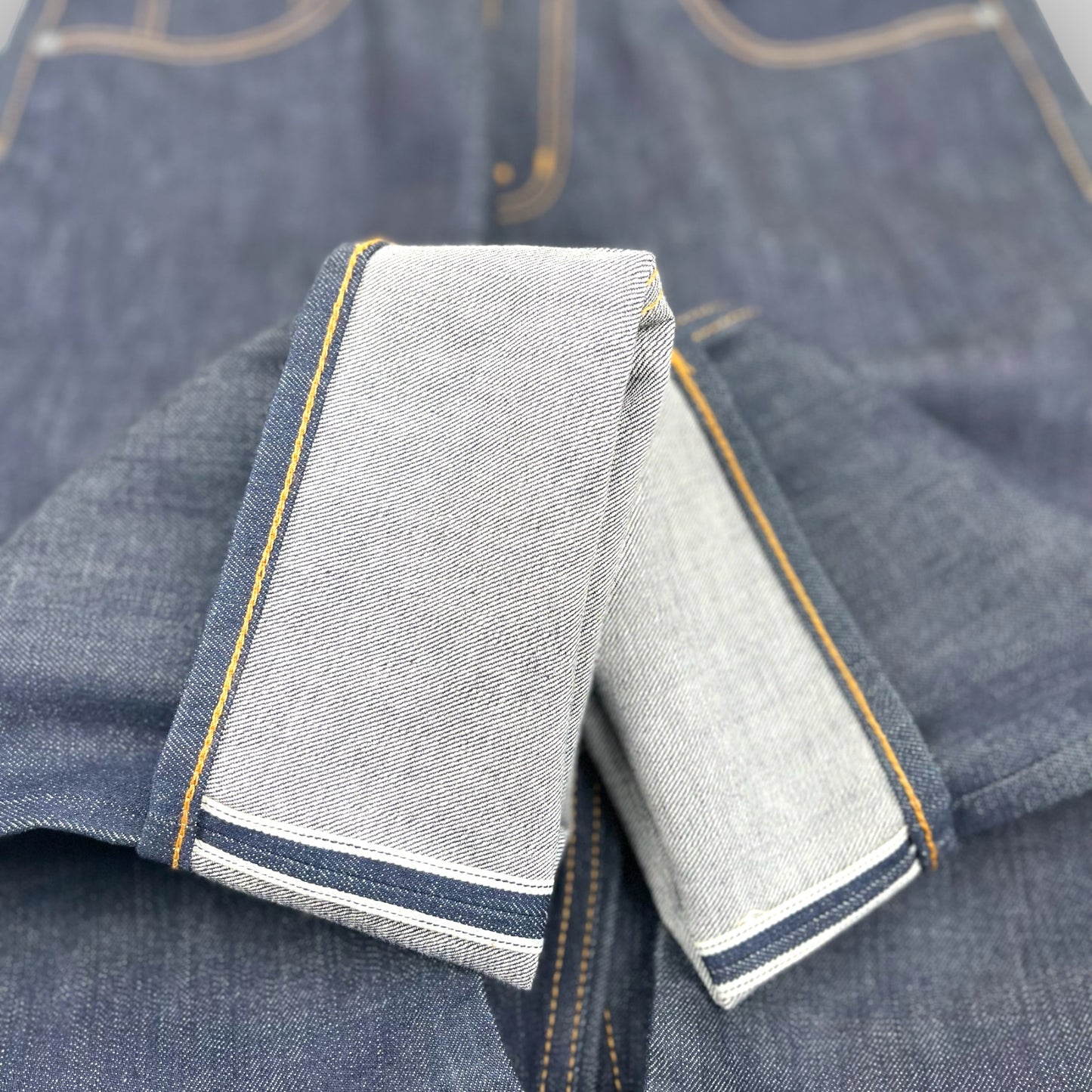 MID-RISE SKINNY FIT IN RAW SELVEDGE