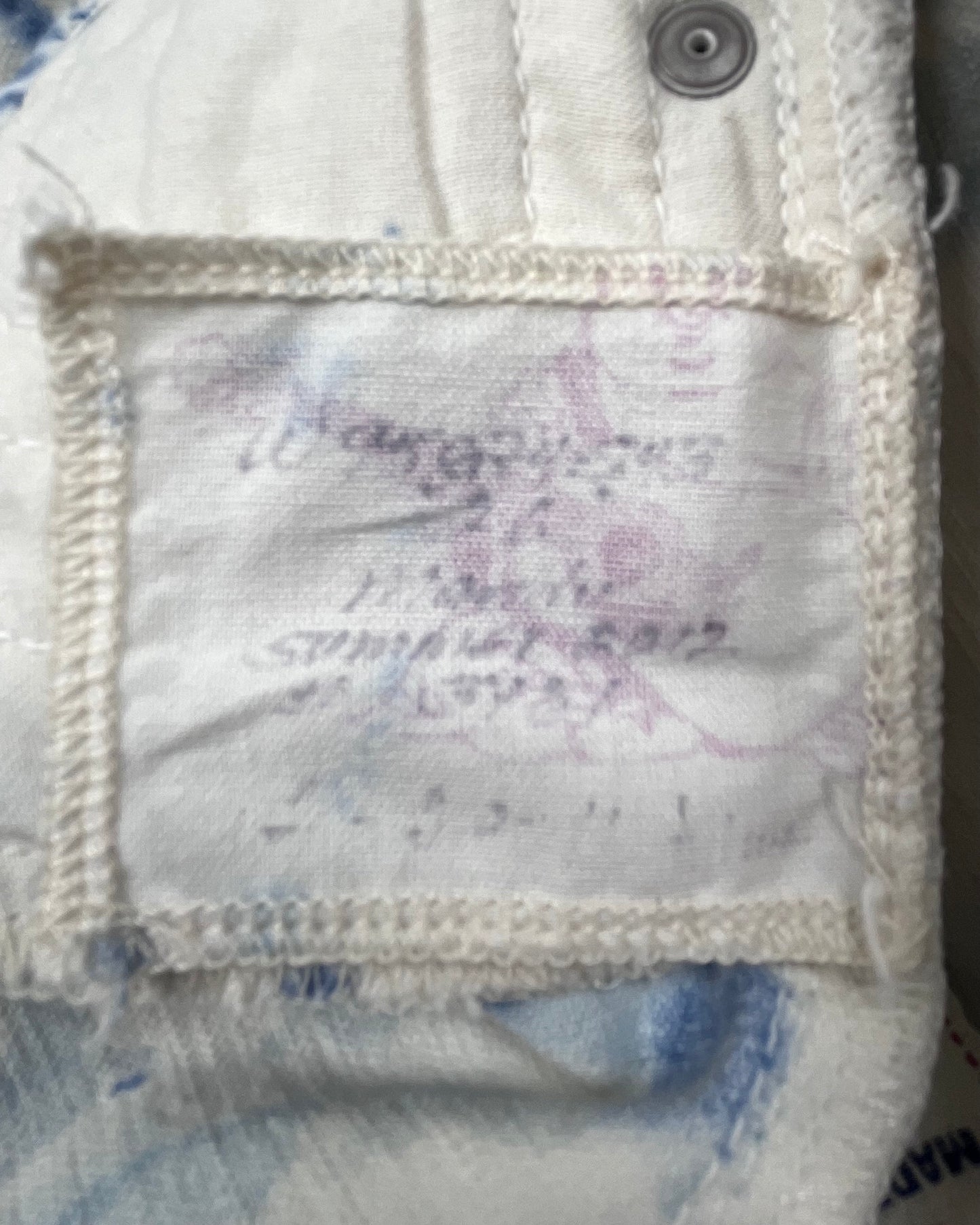 TRUE RELIGION CUT-OFF MINI SKIRT IN BLUE TIE-DYE